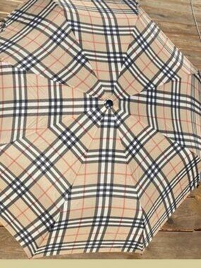 Designer Umbrellas  Burberry. Moschino,